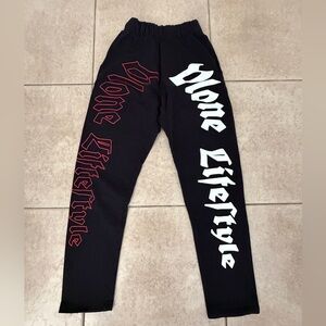 VLONE Black Men’s Leggings with White and Red Side Script